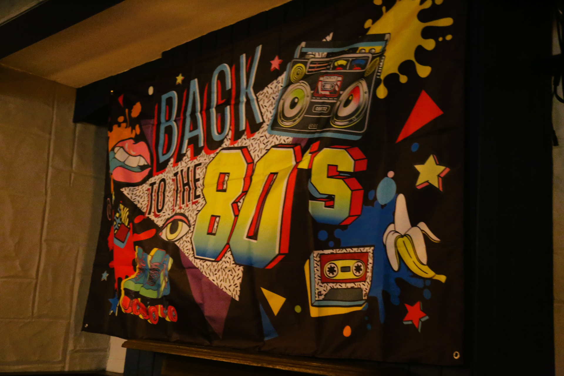 Back to the 80's party banner at Mick Burke's