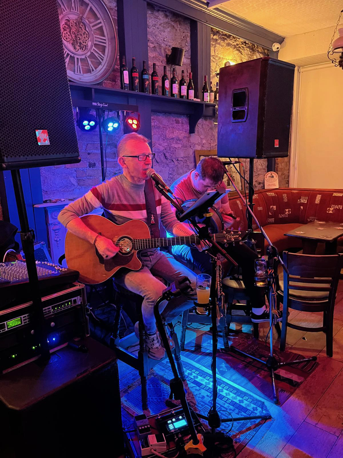 Acoustic duo under the stage lights